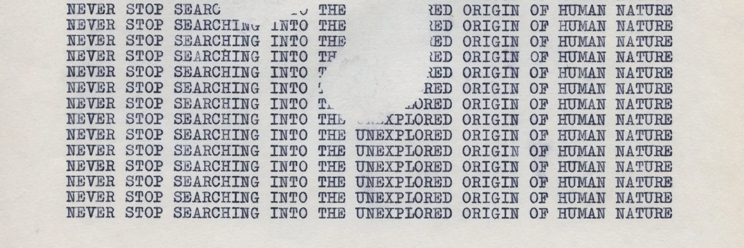 Schreibmaschinengrafik mit den Worten "Never stop searching into the unexplored origin of Human Nature"