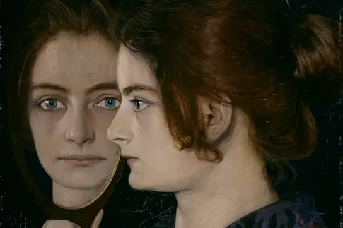 Ein Porträt einer Frau mit einem Spiegel