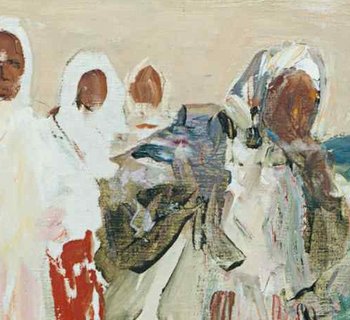 eine Gruppe Frauen im Gewand und Kopftuch in einem Feld